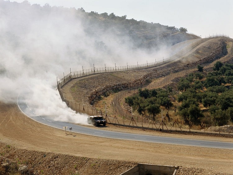 Shai Kremer, Shvil Tistush alongside The Separation Fence, Etz Efrayim
2004, Archival Pigment Print